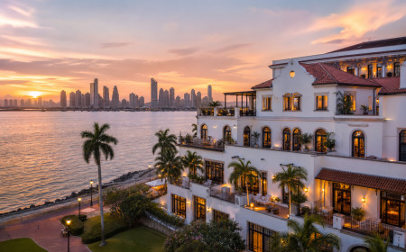 panoramic thumbnail of Sofitel Legend Casco Viejo at sunset, with colonial architecture, palm trees, waterfront views, and Panama City skyline in the distance